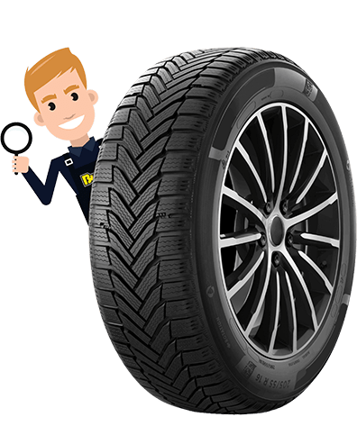 A tyre with a man poking out the top holding a magnifying glass