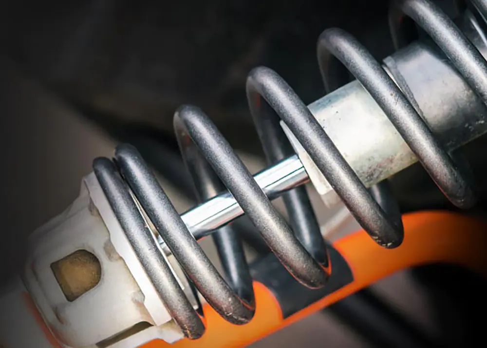 suspension spring and shock absorber